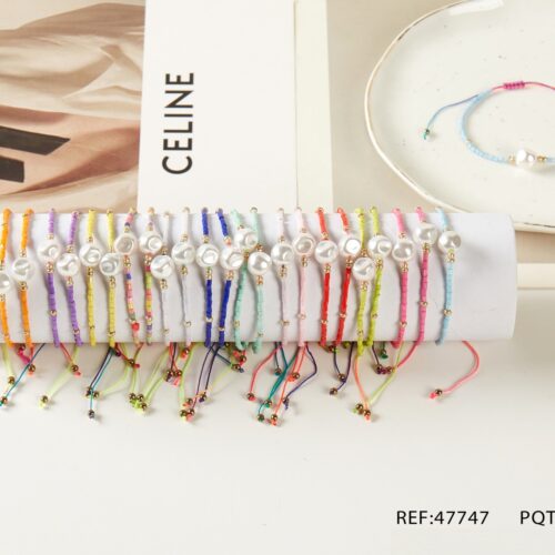 Pulsera Cuerda Bolitas y Perla