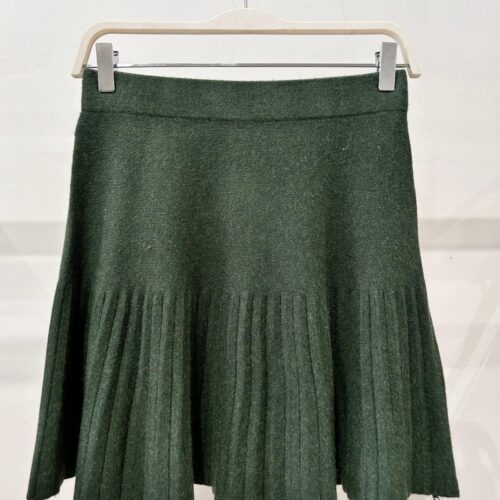 Falda Corta Lisa de Punto Plisada